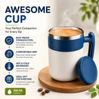 A 200 ml stainless steel travel coffee cup with a white body, blue handle and lid, and a silver rim, shown on a wooden coaster with coffee beans. The left side features promotional text highlighting its rust-proof steel, ergonomic grip, hot/cold beverage capability, and gift appeal.