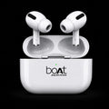 White wireless earbuds in an open charging case with the brand name 'boat plug into nirvana' printed on the front, set against a solid black background.